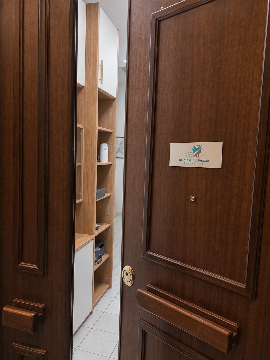 Interior door of Studio Finizio with its sign